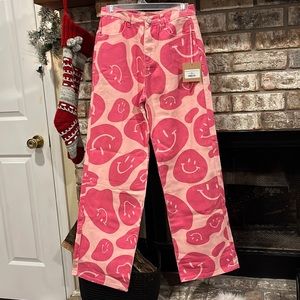 Smiley face print jeans